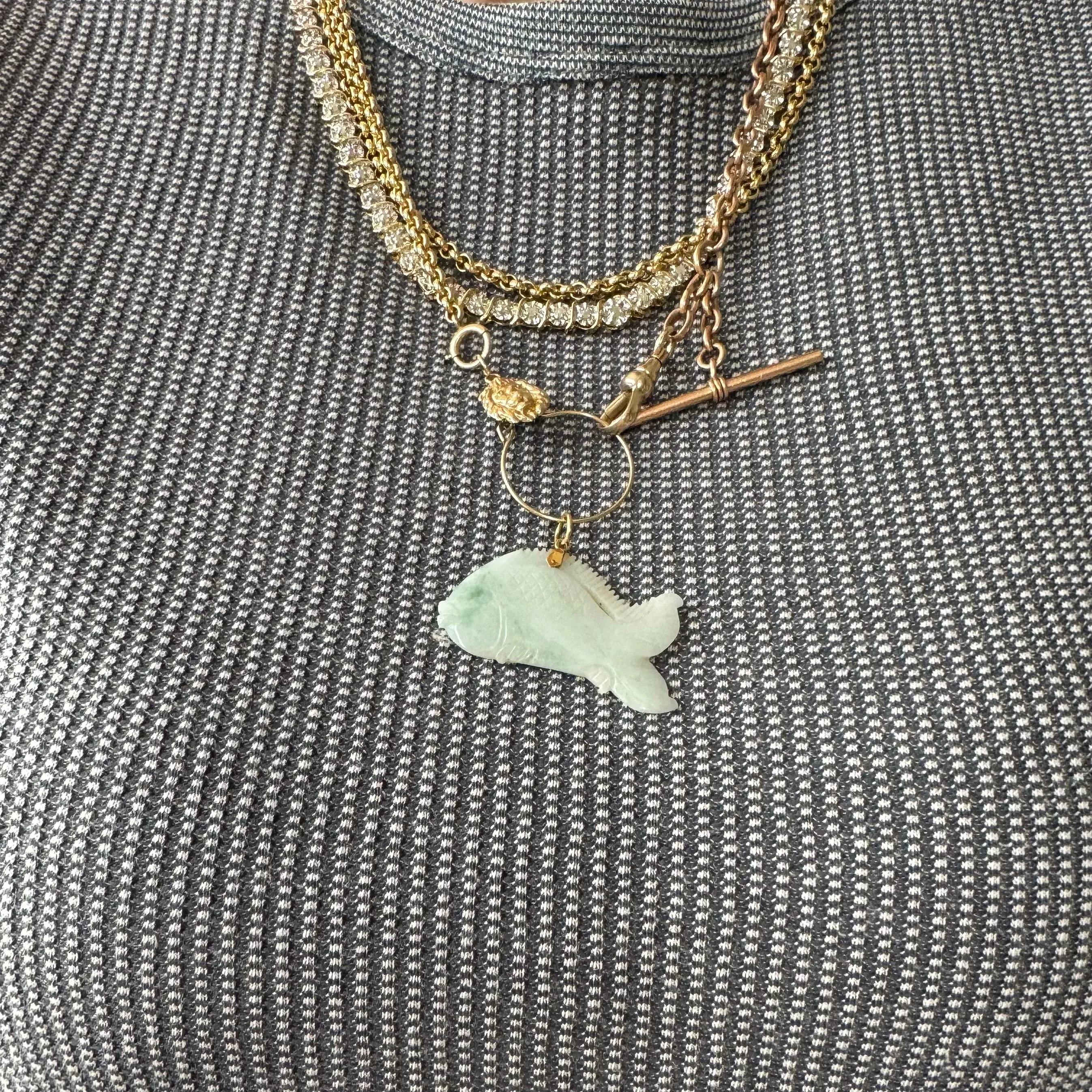 V I N T A G E // kissy fish / 14k and carved stone fish / a pendant